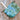 Ice Dyed Project Bags - XLarge with unique blue-green pattern, cotton fabric, and strap on wooden floor.