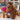 Large Natural Inkari Stuffed Alpaca animal in a cozy shop setting, featuring soft brown fur and a charming expression.