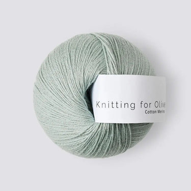 Knitting for Olive COTTON MERINO yarn ball in light green, soft blend of cotton and Merino wool, perfect for all-year garments.