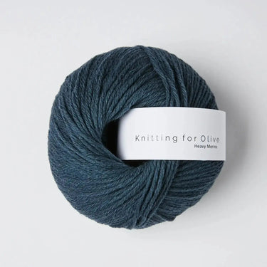 Knitting for Olive Heavy Merino yarn ball made from 100% Merino wool, showing natural texture. Ethically sourced from New Zealand sheep.
