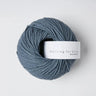 Knitting for Olive Heavy Merino yarn ball in blue, soft 100% Merino wool from New Zealand, perfect for knitting projects.