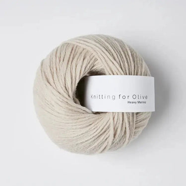 Knitting for Olive Heavy Merino yarn ball made of 100% Merino wool, soft texture, natural color, sourced from New Zealand's ethical farms.