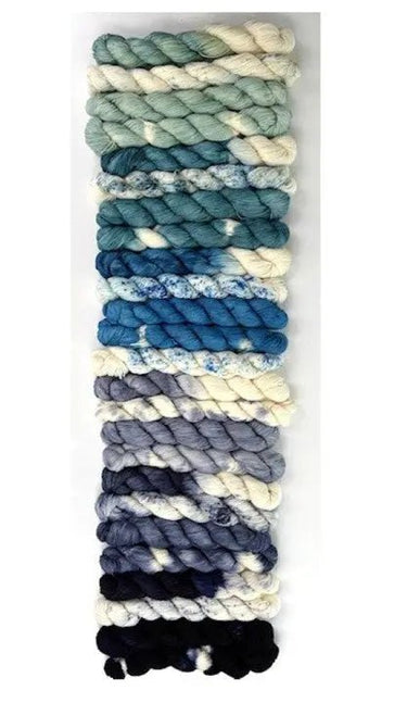 Colorful yarn skeins from Yarn Advent Calendar, Kokon Blue Knit Me An Ocean. Perfect for creative knitting projects.