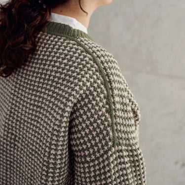 Close-up of a knit sweater design from Laine Magazine Issue 27, showcasing intricate patterns and textures.