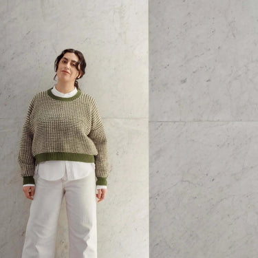 Model wearing a knitted sweater from Laine Magazine Issue 27 - Winter PRE-ORDER collection, showcasing winter fashion designs.