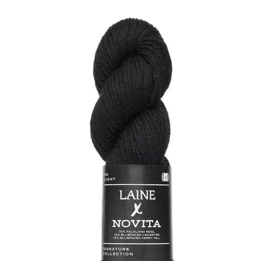 Black skein of Laine x Novita DK yarn made from British Falkland wool, Bluefaced Leicester, and Kerry Hill.