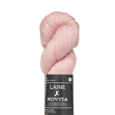 Ball of pink yarn with Laine x Novita label on a white background