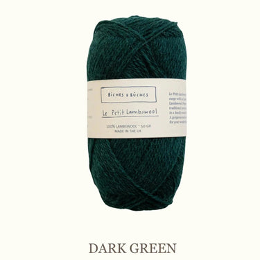 Le Petit Lambswool dark green yarn by Biches et Bûches, perfect for knitting with a touch of tweed and speckles for texture.
