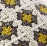 Colorful granny squares in a Crochet a Granny Square Workshop.