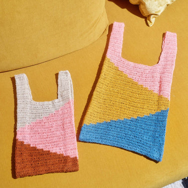 Colorful crochet bags featured in Let's Crochet Issue 2 by Laine, showcasing modern crochet designs. Available for pre-order now.