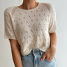 Lillie Tee knitted in Pascuali Suave, front view of the cream lace tee