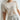 Lillie Tee in cream worn with white trousers, front view
