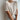 Lillie Tee in cream worn with white trousers
