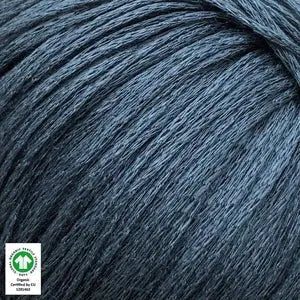 Close-up of Løvetand by CaMaRose, a 100% organic linen chainette yarn in dark blue, ideal for summer knitwear and crochet projects.