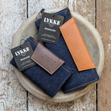Lykke Weekender Knitting Needle Travel Case in denim and vegan leather, perfect for organizing knitting tools on the go.