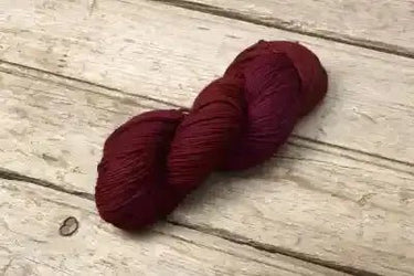 Maxima yarn by Manos del Uruguay in Oxblood option at Knit With Me yarn shop