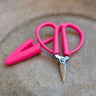 Fox & Pine Mini Scissors in pink with silicone cover; sharp, compact, ideal for travel. Measures 2.5" long. Available in three colors.