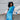 Model wearing vibrant crocheted clothing from Molla Mills Hooks Out collection