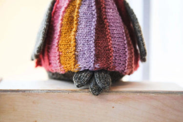 Laine | Mouche & Friends | Seamless Knitted Toy Patterns, , Knit 12 adorable toy animals with clothes in Mouche & Friends. A seamless knitting journey with stories, tutorials, and charming character design., Knit With Me