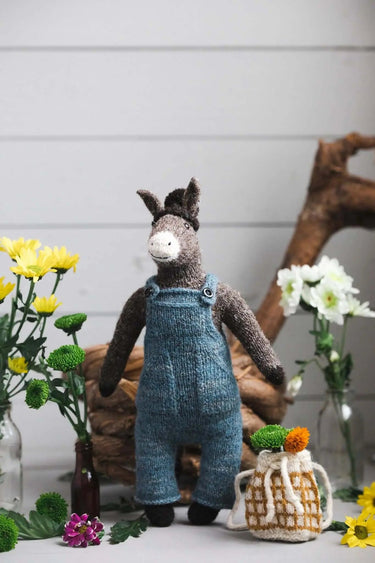 Laine | Mouche & Friends | Seamless Knitted Toy Patterns, , Knit 12 adorable toy animals with clothes in Mouche & Friends. A seamless knitting journey with stories, tutorials, and charming character design., Knit With Me