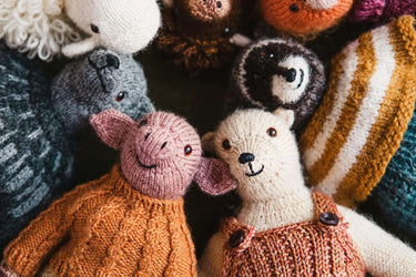 Laine | Mouche & Friends | Seamless Knitted Toy Patterns, , Knit 12 adorable toy animals with clothes in Mouche & Friends. A seamless knitting journey with stories, tutorials, and charming character design., Knit With Me