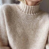 Close-up of a cozy beige sweater, related to Knitted Jumper Workshop