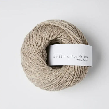 Knitting for Olive Heavy Merino yarn ball made of 100% Merino wool, showcasing natural texture and soft quality.