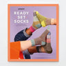 Cover of Ready Steady Sock Knitting Book by Pom Pom featuring colorful sock designs.