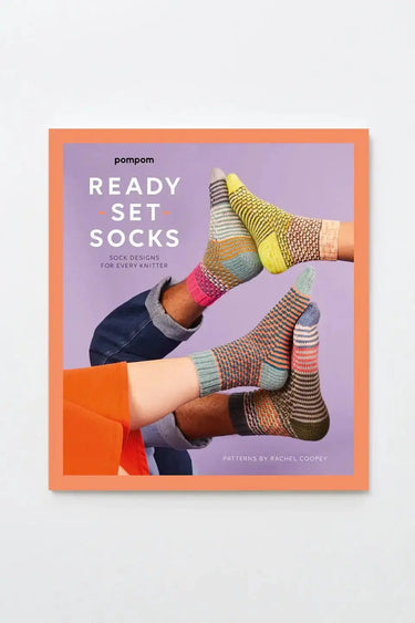 Cover of Ready Steady Sock Knitting Book by Pom Pom featuring colorful sock designs.