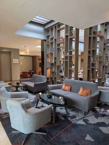 Clayton Hotel lounge in Chiswick, setting for Knit & Natter knit social event with cosy seating and modern decor.