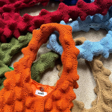 Colorful knitted bags with architectural spikes from Romanesco Bag Workshop by Ranti
