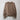 Simple and Simple Sweater Kit knitted in KFO Merino and Soft Silk Mohair, hanging on a wall, at Knit With Me yarn shop