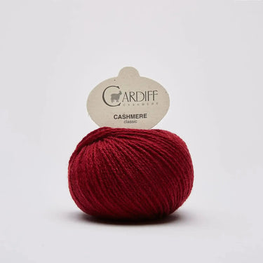 Cardiff Cashmere yarn ball in red, part of the Sophie Scarf Kit.