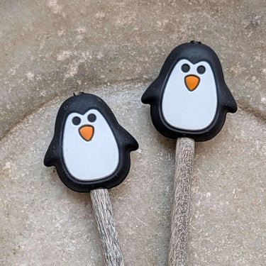 Cute penguin Stitch Stoppers by Fox & Pine Stitches on knitting needles