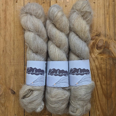 Zakami | Suri Fluff Lace | Baby Suri Alpaca & Silk Yarn, Colour: Oatmeal, This incredibly soft blend of Baby Suri Alpaca and Silk is an absolute dream. So very soft and light. It can be used on it's own or held together with a strand of heavier weight yar