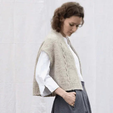 Model wearing wool knitwear from A Knitter's Guide collection