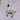 Twill + Print Enamel Pins featuring a white alpaca design, perfect for decorating bags or cases. High-quality smooth, durable enamel.
