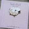 Twill + Print Enamel Pins featuring a Little White Sheep on a decorative card, perfect for adding charm to bags or cases.