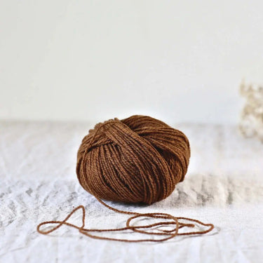 Ulysse Yarn | De Rerum Natura (Sport Weight) in Caramel colour at Knit With Me yarn shop